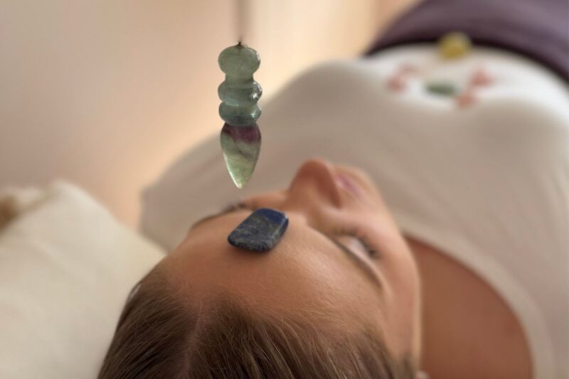 Pendulum used during a crystal healing treatment at Sunshine Holistics in Hertford